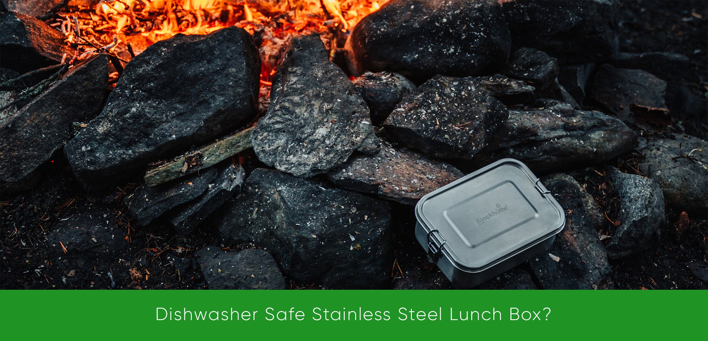 Dishwasher-safe Blockhuette stainless steel lunch box infront of a bofire