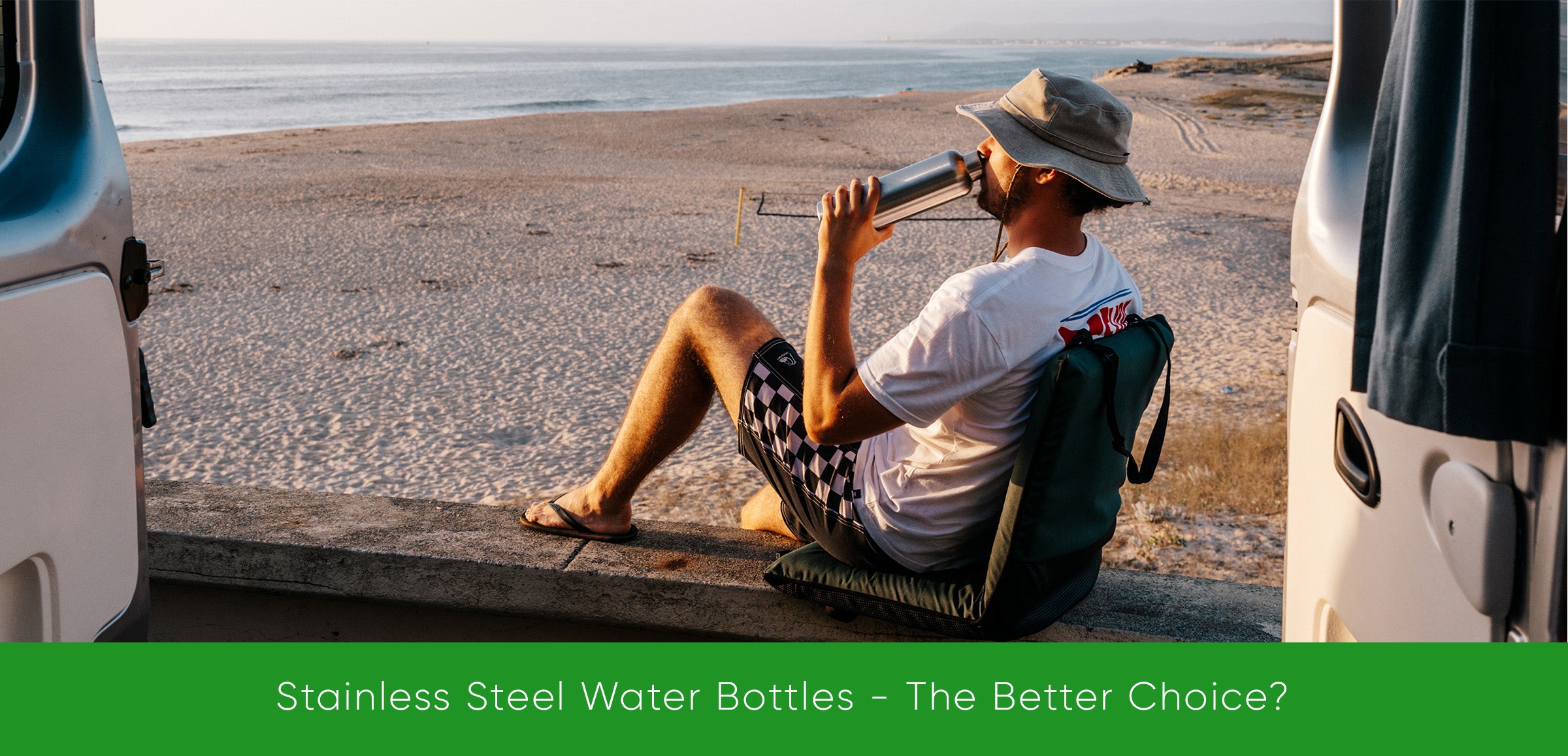 A man sitting outside his van drinking from Blockhuette stainless steel water bottle